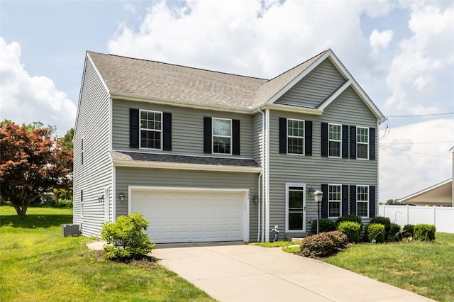 294 Connoquenessing Main St, Connoquenessing Boro, PA 16033 - view of front of house featuring driveway, an attached garage, and a shingled roof