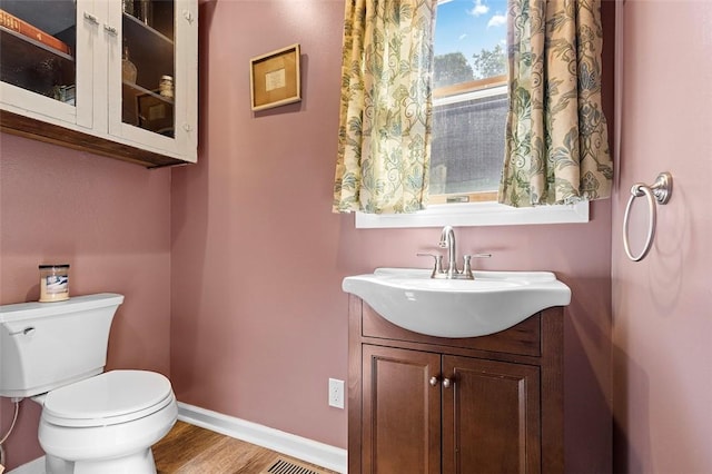1101 6th Ave, Freedom, PA 15042 - bathroom with vanity and wood finished floors