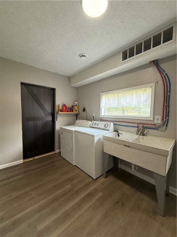 6028 Davidson Rd, Jamestown, PA 16134 - laundry room with independent washer and dryer, light wood-style floors, and a textured ceiling