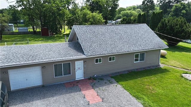 6028 Davidson Rd, Jamestown, PA 16134 - view of front of house with an attached garage, a front lawn, and a shingled roof