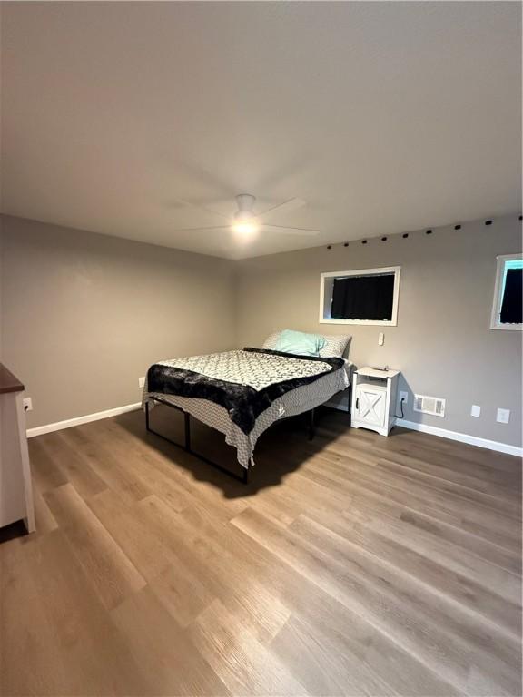 6028 Davidson Rd, Jamestown, PA 16134 - bedroom featuring wood finished floors and ceiling fan
