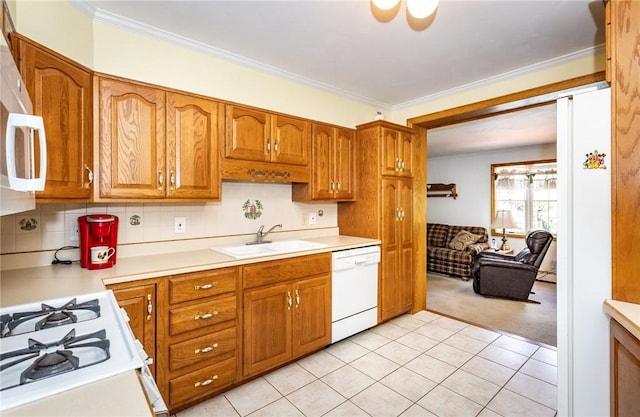 3912 Milton Dr, Richland, PA 15044 - kitchen with white appliances, light colored carpet, brown cabinetry, light countertops, and light tile patterned flooring