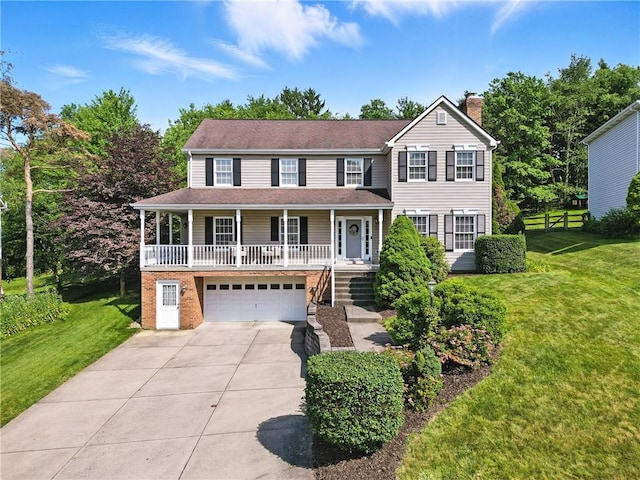 708 Reiser Ct, Cranberry Twp, PA 16066 - colonial house featuring concrete driveway, a chimney, covered porch, an attached garage, and a front yard