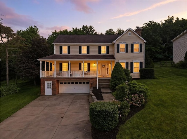 708 Reiser Ct, Cranberry Twp, PA 16066 - view of front of property featuring a chimney, driveway, covered porch, an attached garage, and a yard