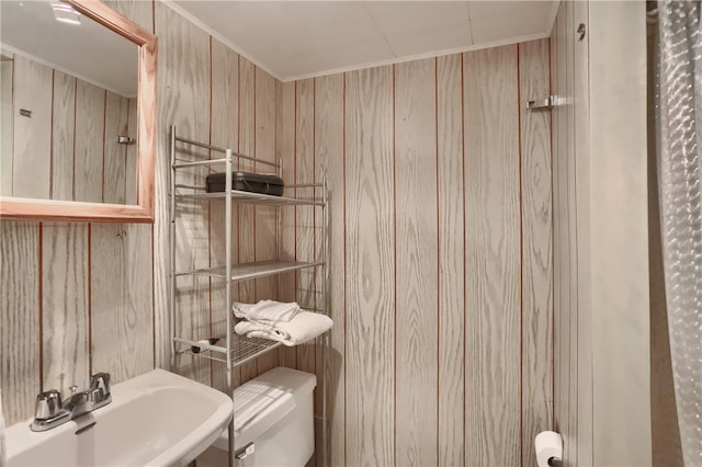 520 38th St, Beaver Falls, PA 15010 - bathroom featuring a sink and wood walls