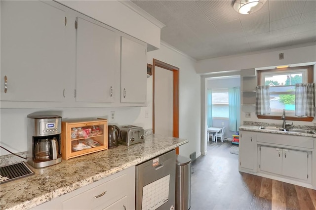 520 38th St, Beaver Falls, PA 15010 - kitchen featuring ornamental molding, white cabinets, light stone countertops, and refrigerator