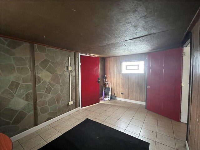 2220 Cronemeyer St, Mckeesport, PA 15132 - tiled foyer entrance featuring wooden walls and baseboards