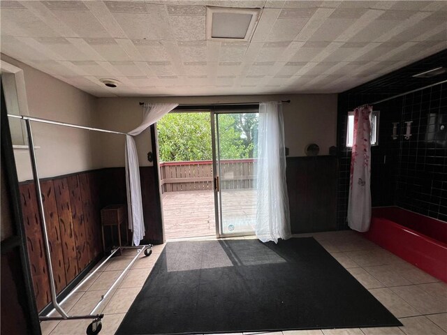 2220 Cronemeyer St, Mckeesport, PA 15132 - doorway featuring wainscoting and tile patterned flooring