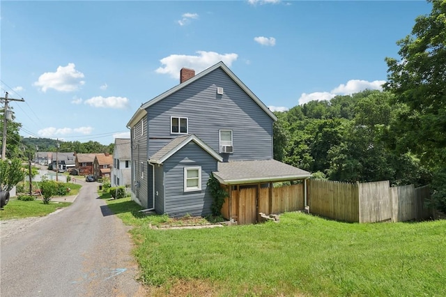 130 Pershing Blvd, Nemacolin, PA 15351 - view of side of home featuring a chimney and cooling unit