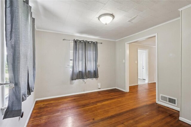 130 Pershing Blvd, Nemacolin, PA 15351 - unfurnished room featuring hardwood / wood-style floors and ornamental molding