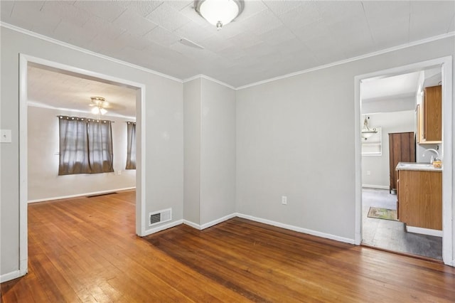 130 Pershing Blvd, Nemacolin, PA 15351 - empty room with crown molding, hardwood / wood-style flooring, and ceiling fan