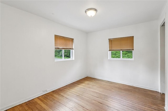 130 Pershing Blvd, Nemacolin, PA 15351 - unfurnished room featuring healthy amount of natural light and wood-type flooring