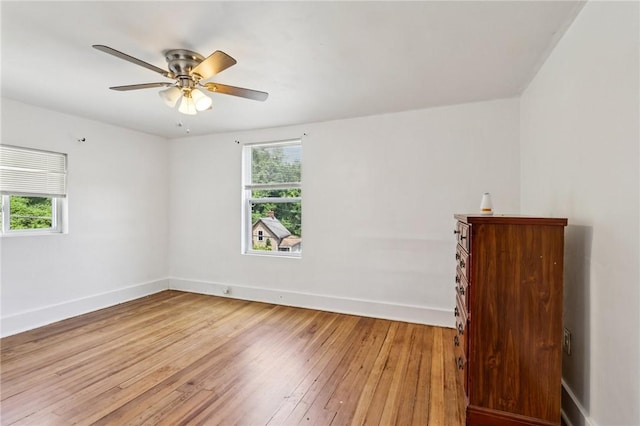 130 Pershing Blvd, Nemacolin, PA 15351 - spare room with healthy amount of natural light, light wood-type flooring, and ceiling fan