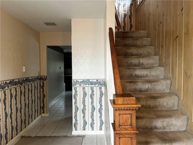 15 S 7th St, Youngwood, PA 15697 - stairway featuring tile patterned floors and wood walls