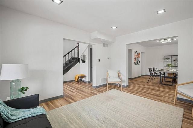 323 N Balph Ave, Ross Twp, PA 15202 - living area featuring stairway and wood finished floors