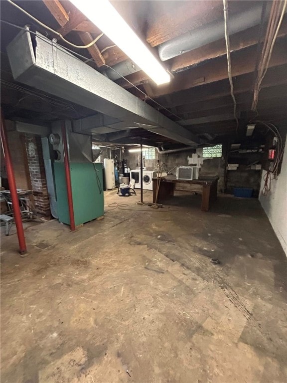 192 Yellow Creek Rd, Lancaster Twp, PA 16037 - below grade area featuring water heater and washer / clothes dryer