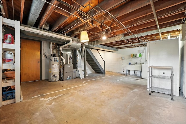 445 Pacific Ave, Forest Hills Boro, PA 15221 - unfinished basement featuring water heater, stairway, washer / clothes dryer, and heating unit