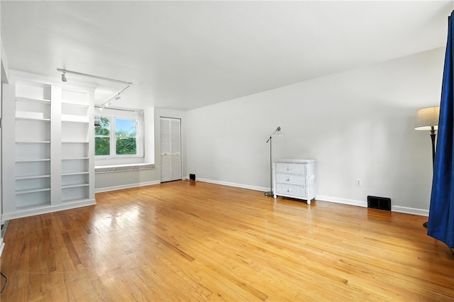 445 Pacific Ave, Forest Hills Boro, PA 15221 - additional living space with light wood finished floors and built in features