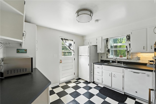445 Pacific Ave, Forest Hills Boro, PA 15221 - kitchen featuring white appliances, dark countertops, light floors, and healthy amount of natural light