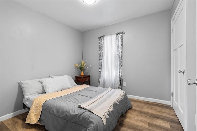 12187 Mantor St, Conneaut Lake, PA 16316 - bedroom with baseboards and wood finished floors