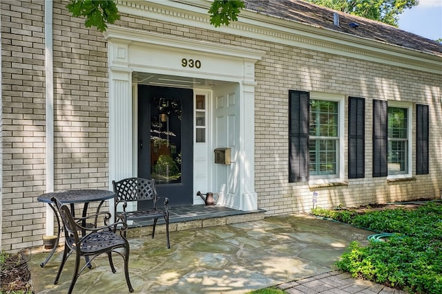 930 Valleyview Rd, Mt Lebanon, PA 15243 - doorway to property featuring brick siding and covered porch