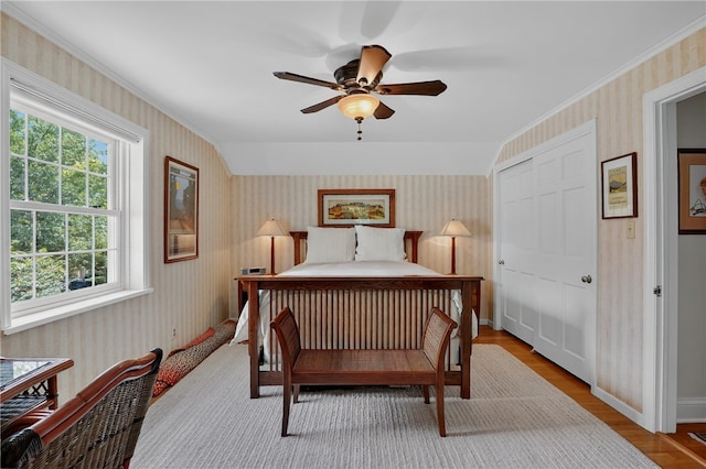 930 Valleyview Rd, Mt Lebanon, PA 15243 - bedroom with wallpapered walls, wood finished floors, crown molding, and a ceiling fan