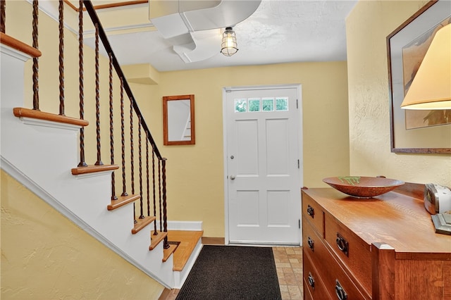 930 Valleyview Rd, Mt Lebanon, PA 15243 - foyer entrance with stairway and a textured wall