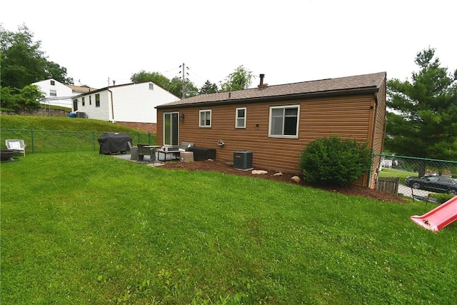 4095 Overlook St, South Park, PA 15129 - rear view of property with an outdoor fire pit and a fenced backyard