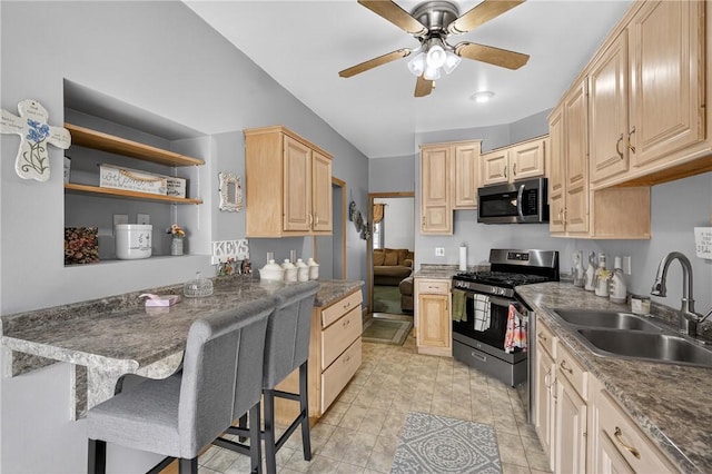 435 Ohio Ave, Glassport, PA 15045 - kitchen featuring appliances with stainless steel finishes, light brown cabinets, ceiling fan, open shelves, and a peninsula