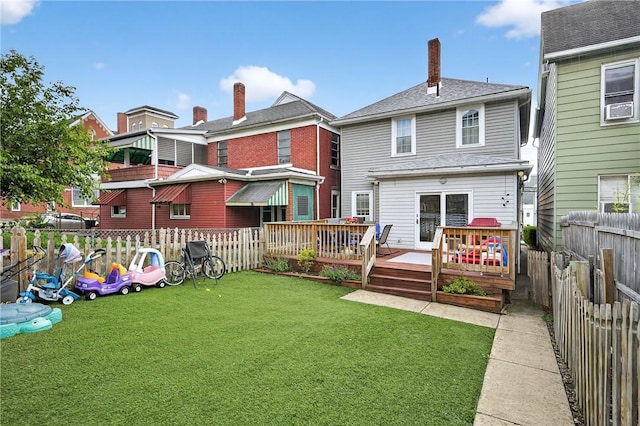 435 Ohio Ave, Glassport, PA 15045 - rear view of property with a fenced backyard, a wooden deck, and a chimney