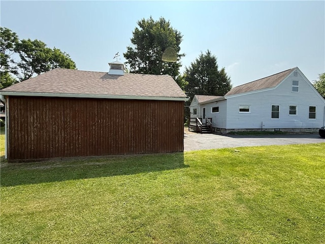 3170 Dutch Ridge Rd, Brighton Twp, PA 15009 - view of home's exterior featuring a yard, a chimney, and an outbuilding