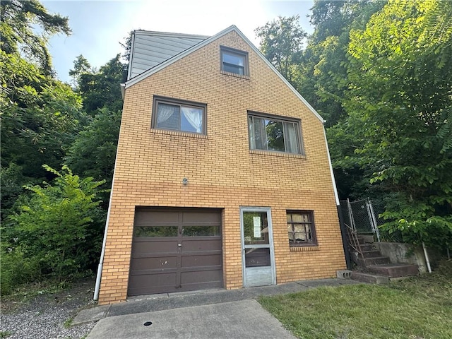 998 Chartiers Ave, Carnegie, PA 15106 - view of front of home featuring brick siding and driveway
