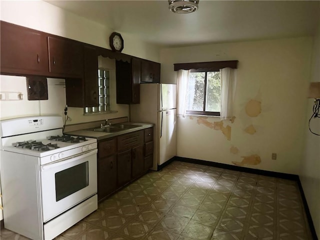 998 Chartiers Ave, Carnegie, PA 15106 - kitchen with white appliances and light floors