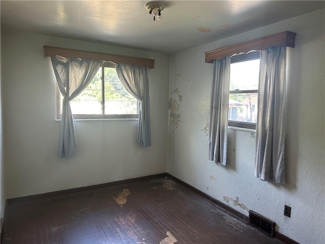 998 Chartiers Ave, Carnegie, PA 15106 - spare room featuring dark wood-type flooring and baseboards