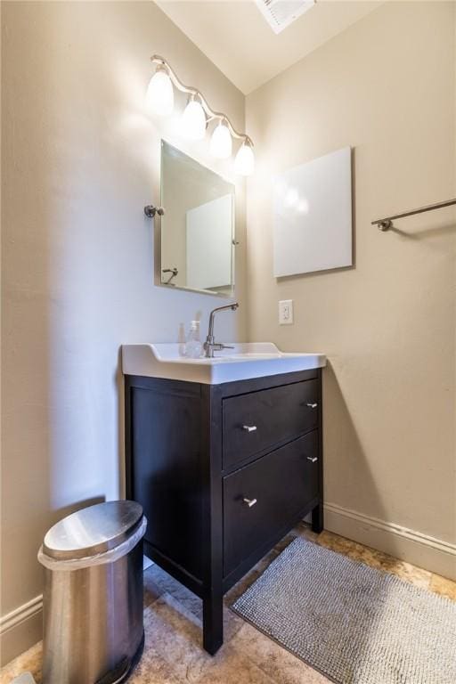 2207 Kenzie Dr, Robinson Twp, PA 15205 - bathroom featuring baseboards and vanity