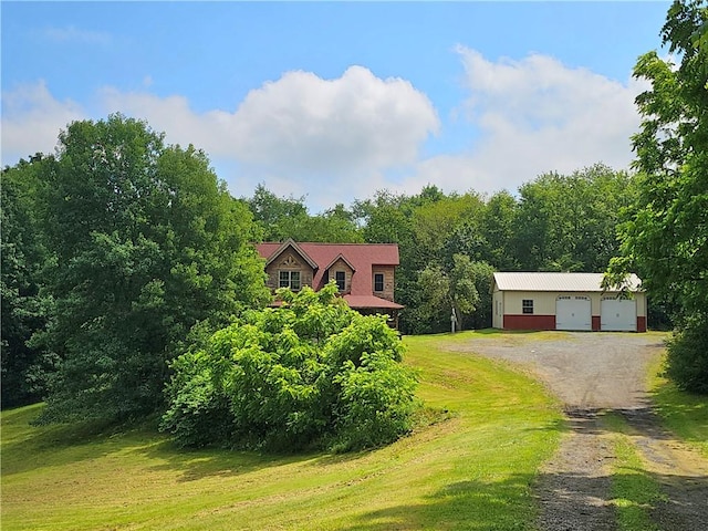 459 Big Knob Rd, New Sewickley Twp, PA 15074 - view of front of property with a front lawn, an outdoor structure, and a detached garage