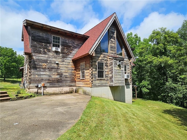 459 Big Knob Rd, New Sewickley Twp, PA 15074 - view of home's exterior featuring a lawn, stone siding, and cooling unit