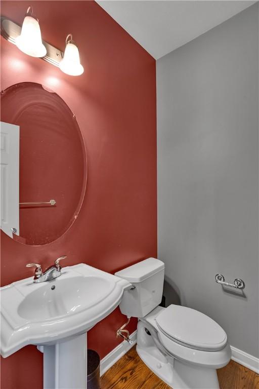 371 Marshall Heights Dr, Marshall, PA 15090 - half bath featuring wood finished floors