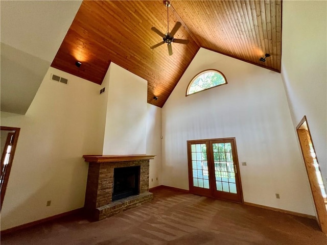 245 Chippewa Dr, Neshannock Twp, PA 16105 - unfurnished living room with high vaulted ceiling, ceiling fan, carpet floors, wood ceiling, and a brick fireplace