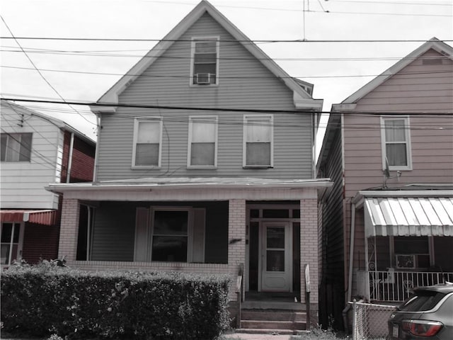 813 8th St, Stowe Twp, PA 15136 - traditional style home with a porch and brick siding