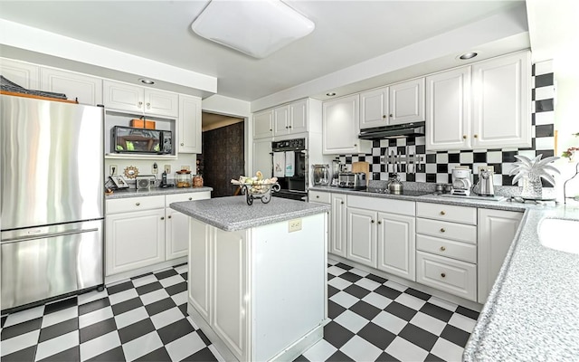 130 Killarney Rd, Pine Twp, PA 15090 - kitchen featuring black appliances, dark flooring, and white cabinetry