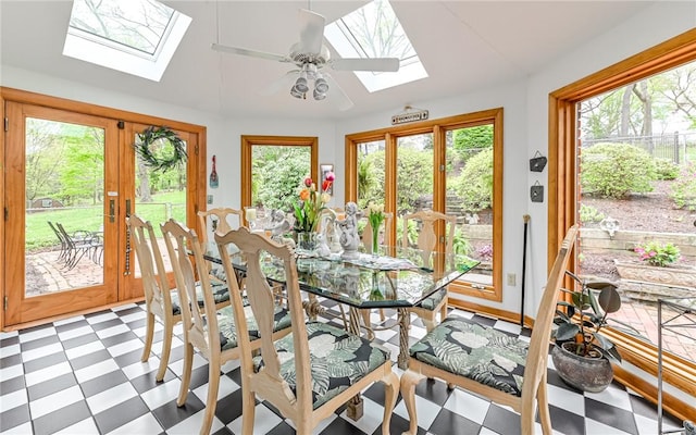 130 Killarney Rd, Pine Twp, PA 15090 - dining room featuring a skylight, light floors, a ceiling fan, lofted ceiling, and french doors