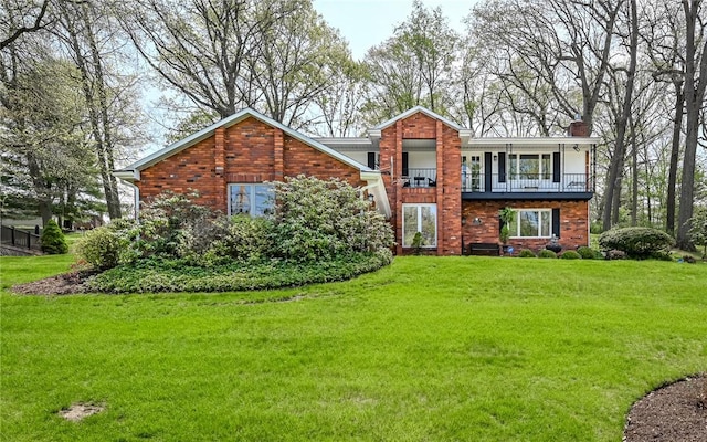 130 Killarney Rd, Pine Twp, PA 15090 - view of front of home with a chimney, a front lawn, a balcony, and brick siding