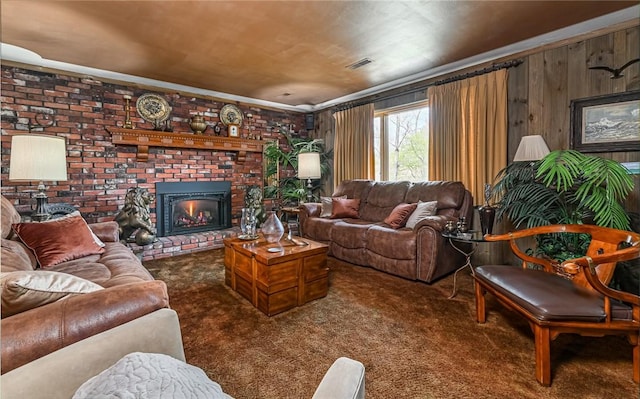 130 Killarney Rd, Pine Twp, PA 15090 - carpeted living room featuring a brick fireplace, wood walls, and crown molding