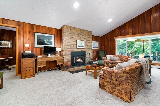 180 Lower Harmony Rd, Connoquenessing Twp, PA 16052 - living room featuring wooden walls, light carpet, a textured ceiling, lofted ceiling, and a baseboard radiator