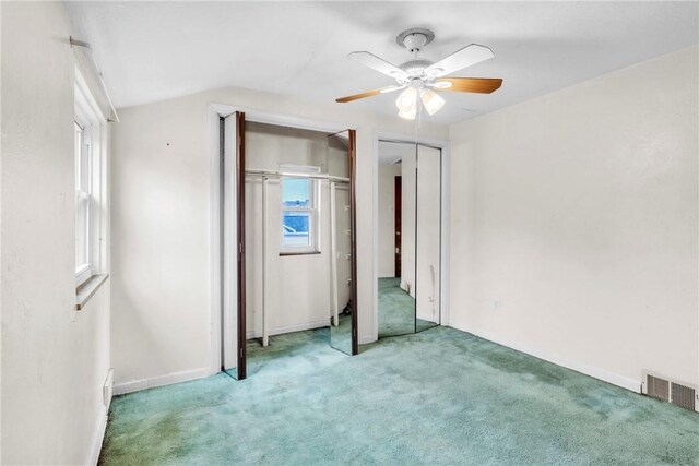 3405 Willett Rd, Baldwin Boro, PA 15227 - unfurnished bedroom with carpet flooring, multiple closets, multiple windows, lofted ceiling, and a ceiling fan