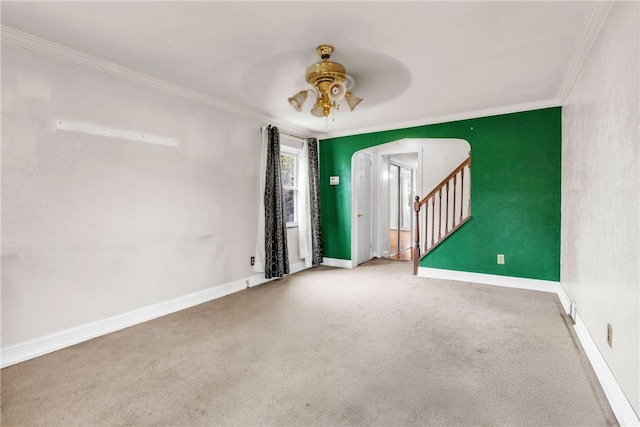 3405 Willett Rd, Baldwin Boro, PA 15227 - empty room featuring a ceiling fan, crown molding, carpet, stairway, and arched walkways
