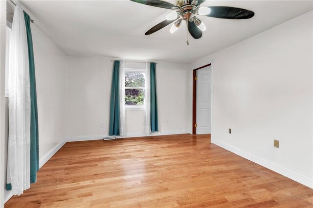 3405 Willett Rd, Baldwin Boro, PA 15227 - unfurnished room with light wood finished floors and a ceiling fan
