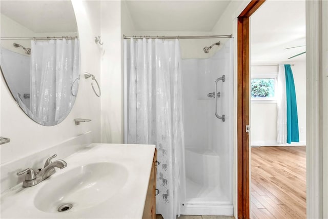 3405 Willett Rd, Baldwin Boro, PA 15227 - bathroom with a shower with curtain, wood finished floors, and vanity