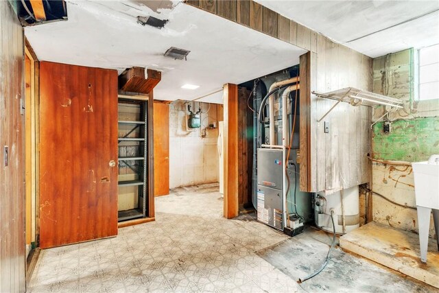 3405 Willett Rd, Baldwin Boro, PA 15227 - below grade area with tile patterned floors and freestanding refrigerator
